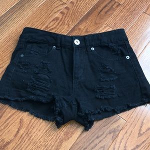 Black ripped shorts